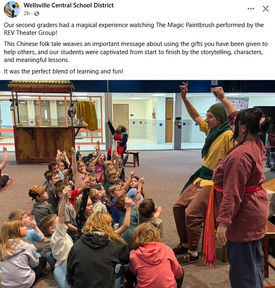 Second Graders from the Wellsville School District Watch the Magic Paintbrush Performance