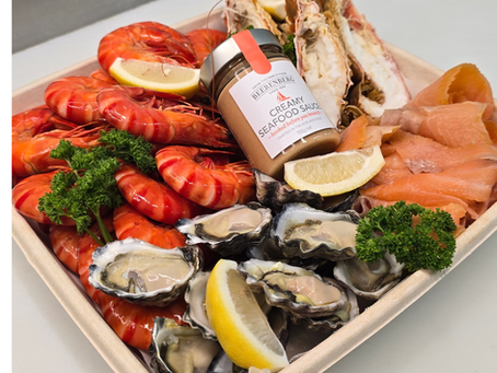 Moofish seafood platter with oysters, bugs, and smoked salmon