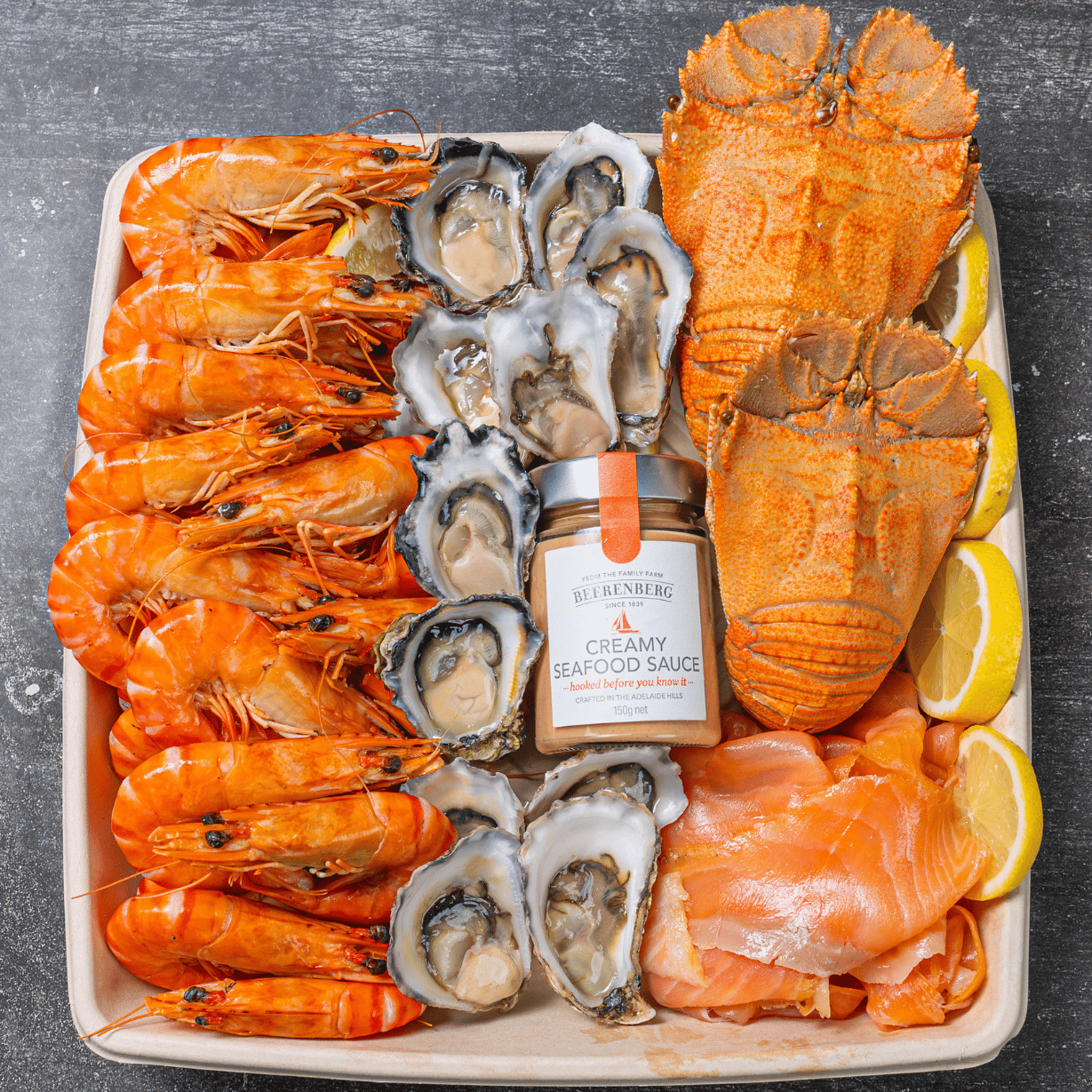 Premium seafood platter for four with Sydney Rock oysters, smoked salmon, Moreton Bay bugs, and tiger prawns and sauce
