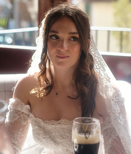 Lisa enjoying a pint of Guinness after her wedding ceremony at Oranmore Lodge Hotel, Galway.