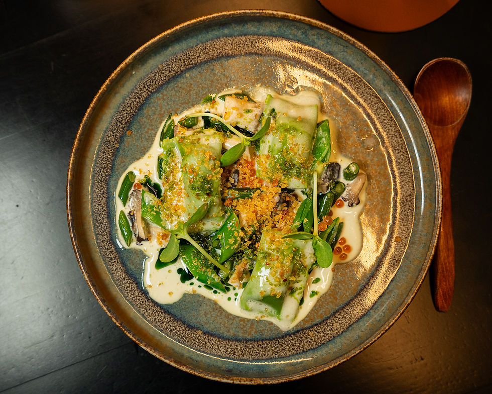 Charred poblano & pepita, garlic scape, Lion’s Farm mushroom ragout, Meyer lemon, and smoked caviar crème.