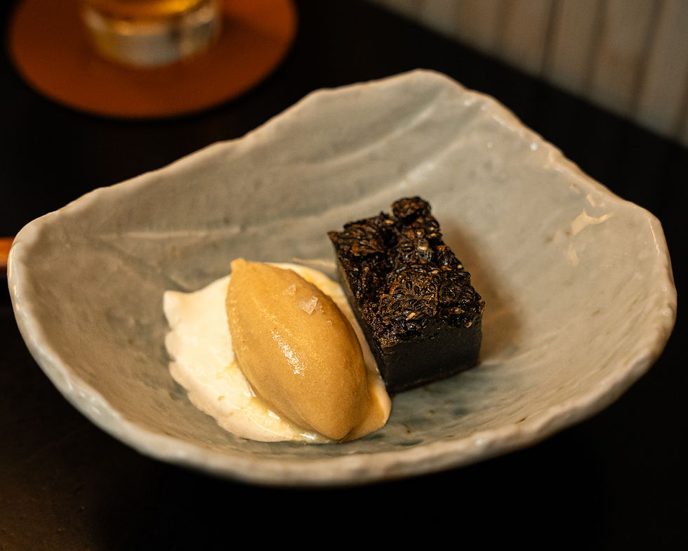 Mochi cake, sesame ice cream, honey, ube ice cream, coconut, and a cocoa sablé.
