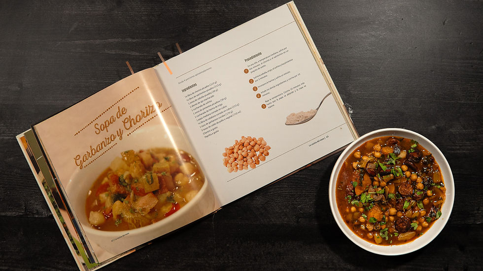 La Cocina del Nieto Cookbook and a bowl of chickpea chorizo soup