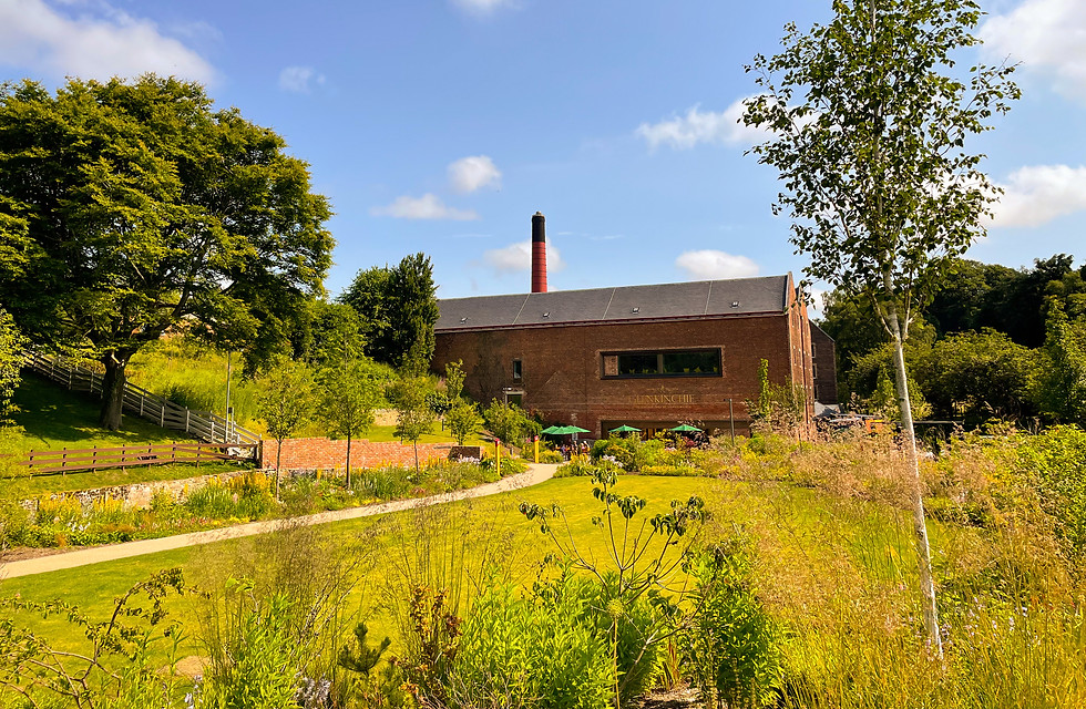 Glenkinchie Distillery and Gardens on a Sunny Day.
