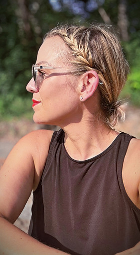 woman in sunglasses looking to her right