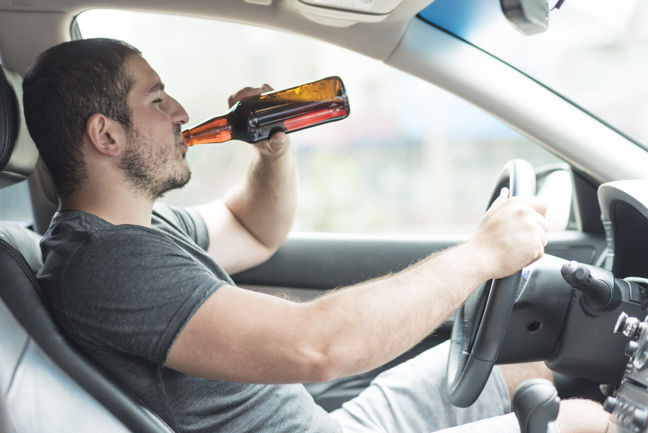 man drinking alcojhol - scrap my car uae