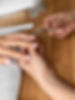 close-up-hand-holding-nail-scissors.jpg