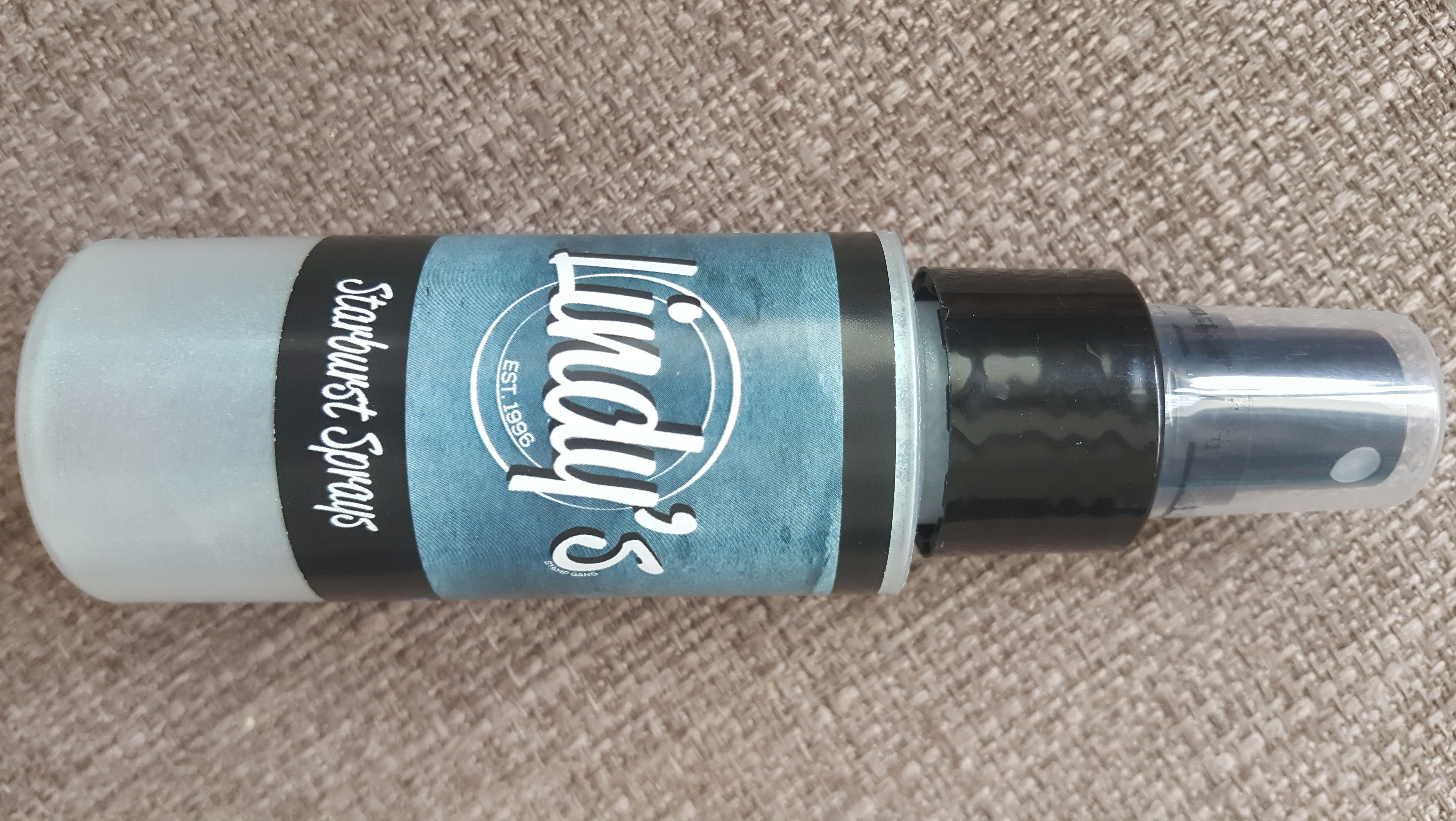 Starburst spray tainted love teal Lindy's