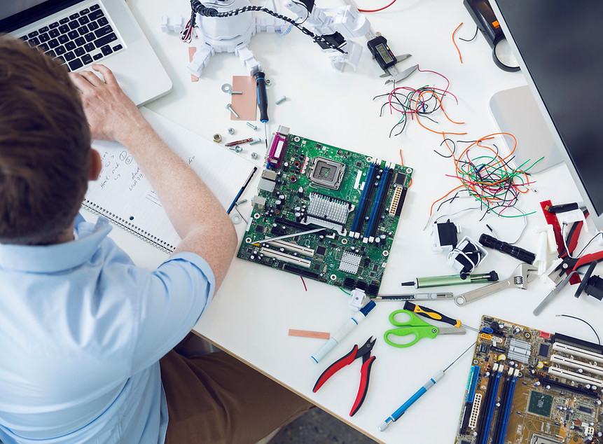 Electrical engineer working on circuit board