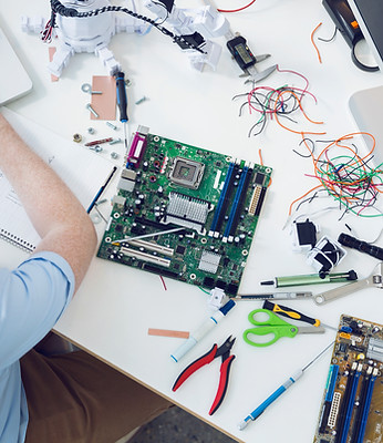 Electrical engineer working on circuit board