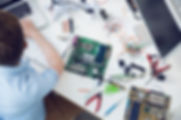 Electrical engineer working on circuit board