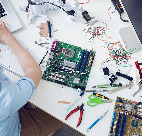 Electrical engineer working on circuit board