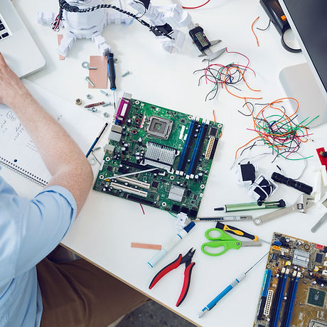 Electrical engineer working on circuit board