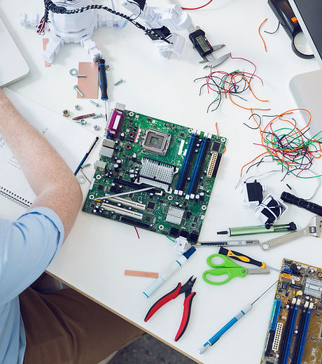 Electrical engineer working on circuit board