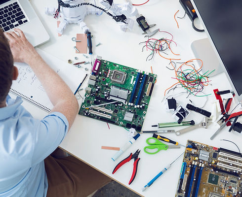 Electrical engineer working on circuit board