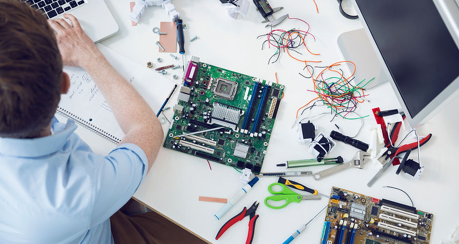 Electrical engineer working on circuit board