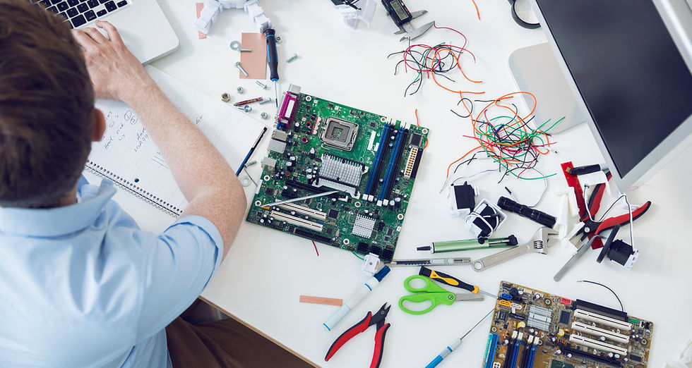 Electrical engineer working on circuit board