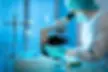 depositphotos_7461191-stock-photo-scientist-working-at-the-laboratory.jpg