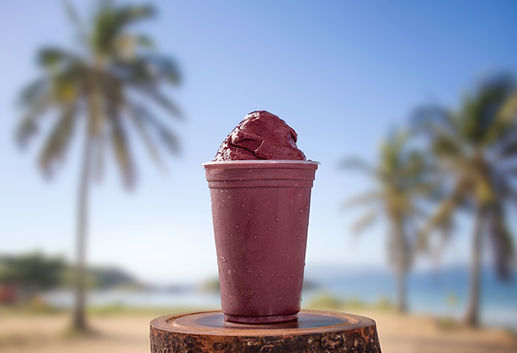 Ice Cream acai Cup on background tropical beach.jpg