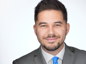 Black Headshot Photographer with studio Tampa takes Headshot of Investor