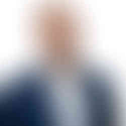 A headshot photo taken at Workspace in Tampa, Florida