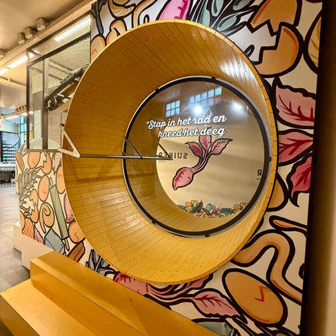 Wheel to start the dough machine in the Kamphuisen syrup waffle factory in Gouda, the Netherlands