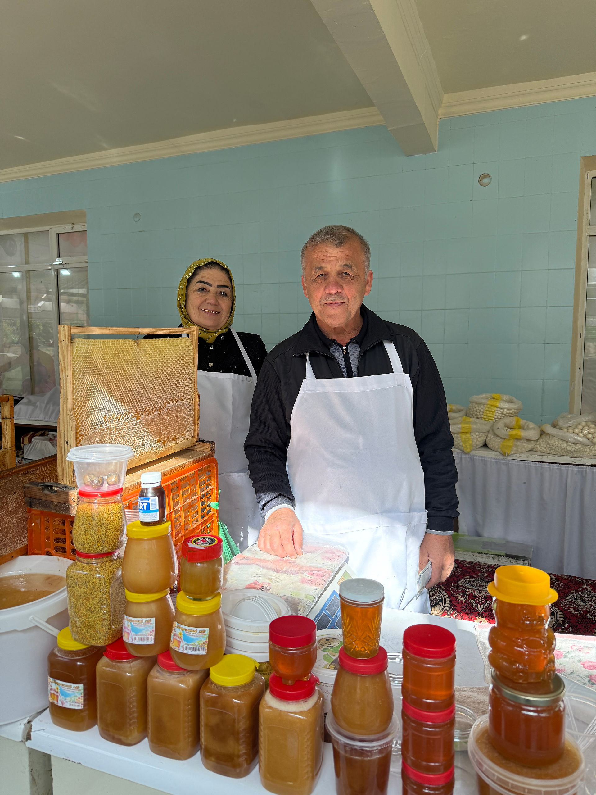 local honey and beekeeper at the Siyab bazaar in Samarkand, Uzbekistan