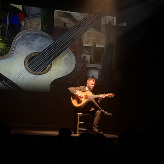 Guitar playing during the flamenco show at the Teatro Flamenco in Madrid, Spain