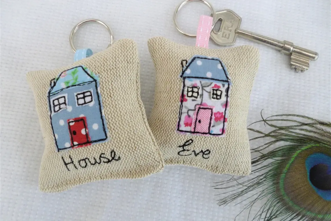 Personalised house keyring on linen. Lavender scented with choice of blue or pink. ribbon and split ring fastening
