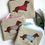 Thumbnail: Personalised Dachshund Sausage Dog purse or wallet.  Choice of design and name.  Fastened with zip and ribbon pull
