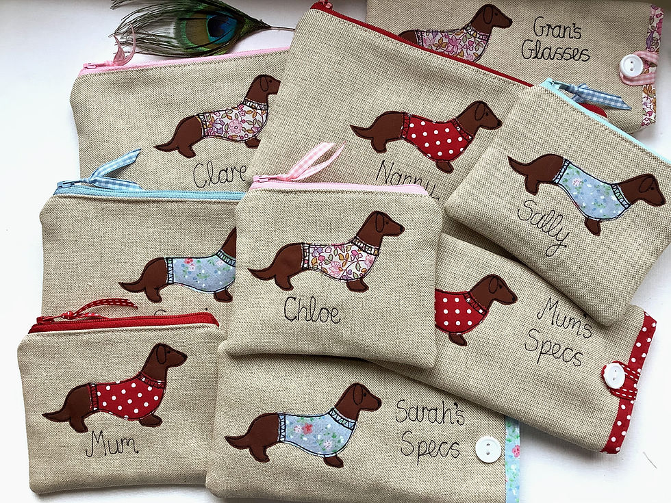 Thumbnail: Personalised Dachshund Sausage Dog cosmetic bag or pencil case. Choice of design and name.  Fastened with zip and ribbon pull