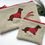 Thumbnail: Personalised Dachshund Sausage Dog purse or wallet.  Choice of design and name.  Fastened with zip and ribbon pull