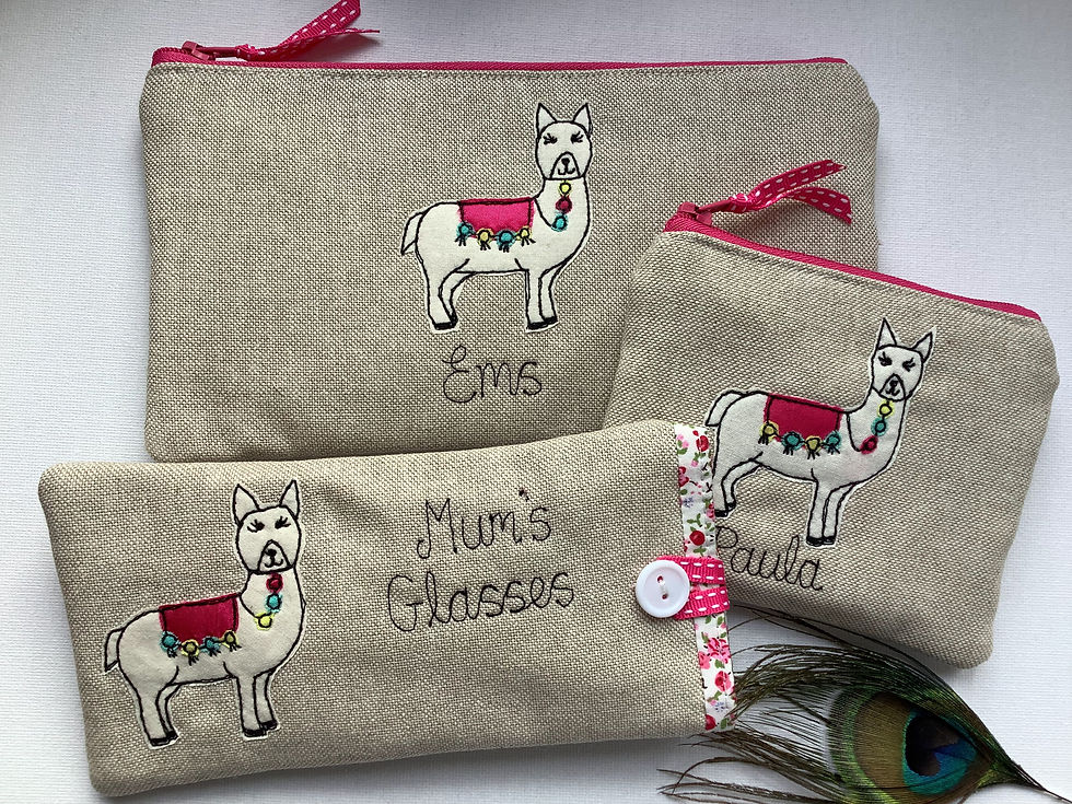 Thumbnail: Alpaca or llama motif on oatmeal linen glasses or sunglasses case or spectacles pouch.  Pink floral lining and personalised