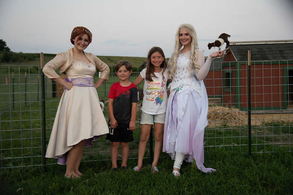 The Snow Sisters sharing their love for animals at Ditmar's Orchard.