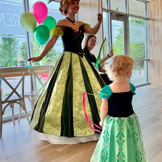 Princess Anna leads ribbon wand dancing