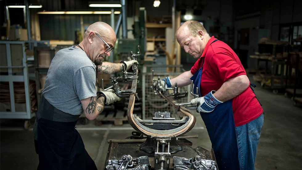 Traditional steam-bending techniques in furniture making highlight the handcrafted processes still used in high-end chair production. Image courtesy of Thonet.