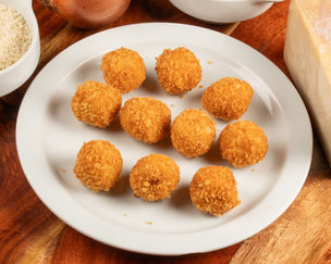 New Smoked IdiazƔbal Cheese and Red Wine Caramelized Onion Croquette at CASA DANI!