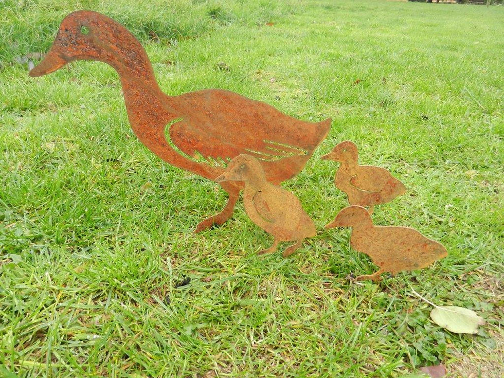 Thumbnail: Rusty Metal Duck Family