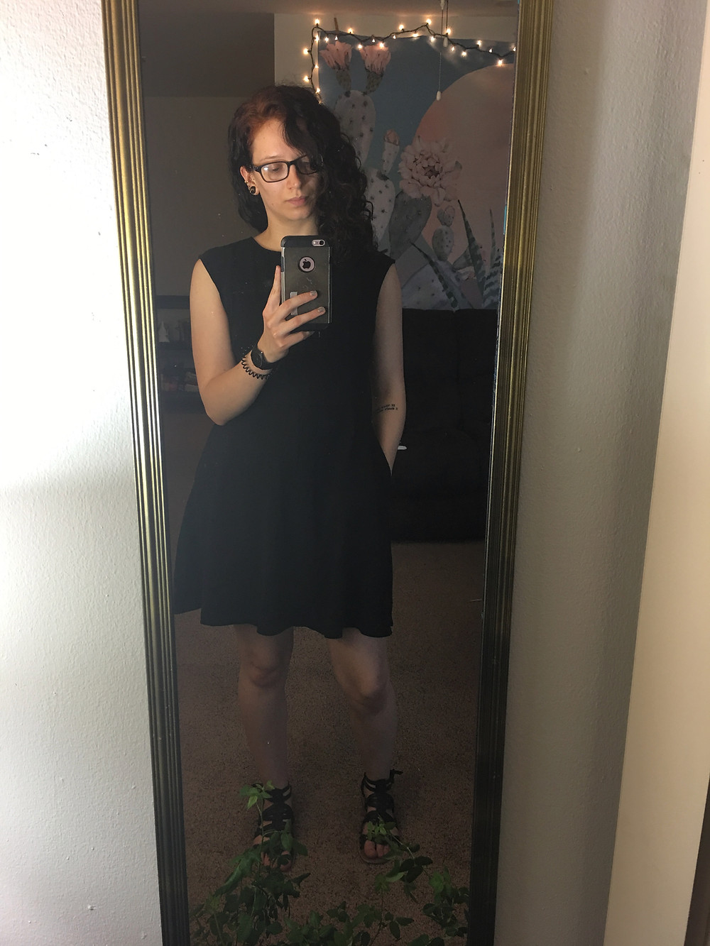 A plain black dress WITH POCKETS! From New York & Company, plus some black sandals