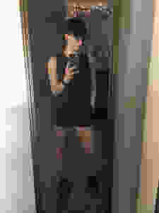 Black athletic shorts (with pockets, of course), a black sleeveless shirt from New Balance, the black baseball hat, and the black and gold Pumas