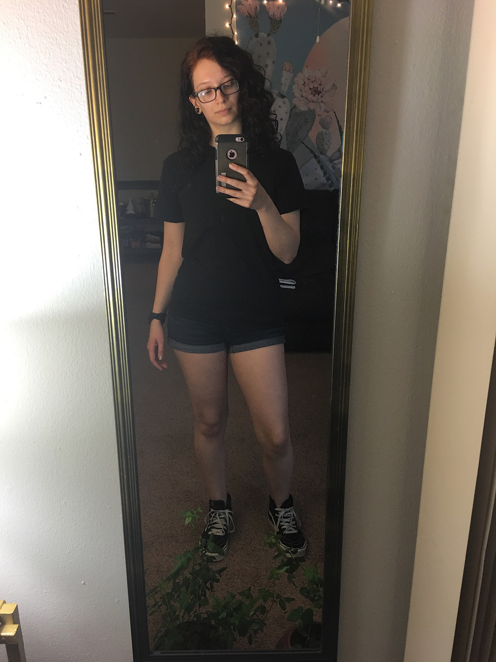 Same shirt, same shoes, plus dark denim shorts