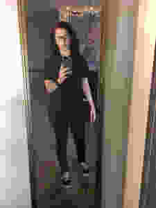 Black t-shirt, black jeans, classic black vans