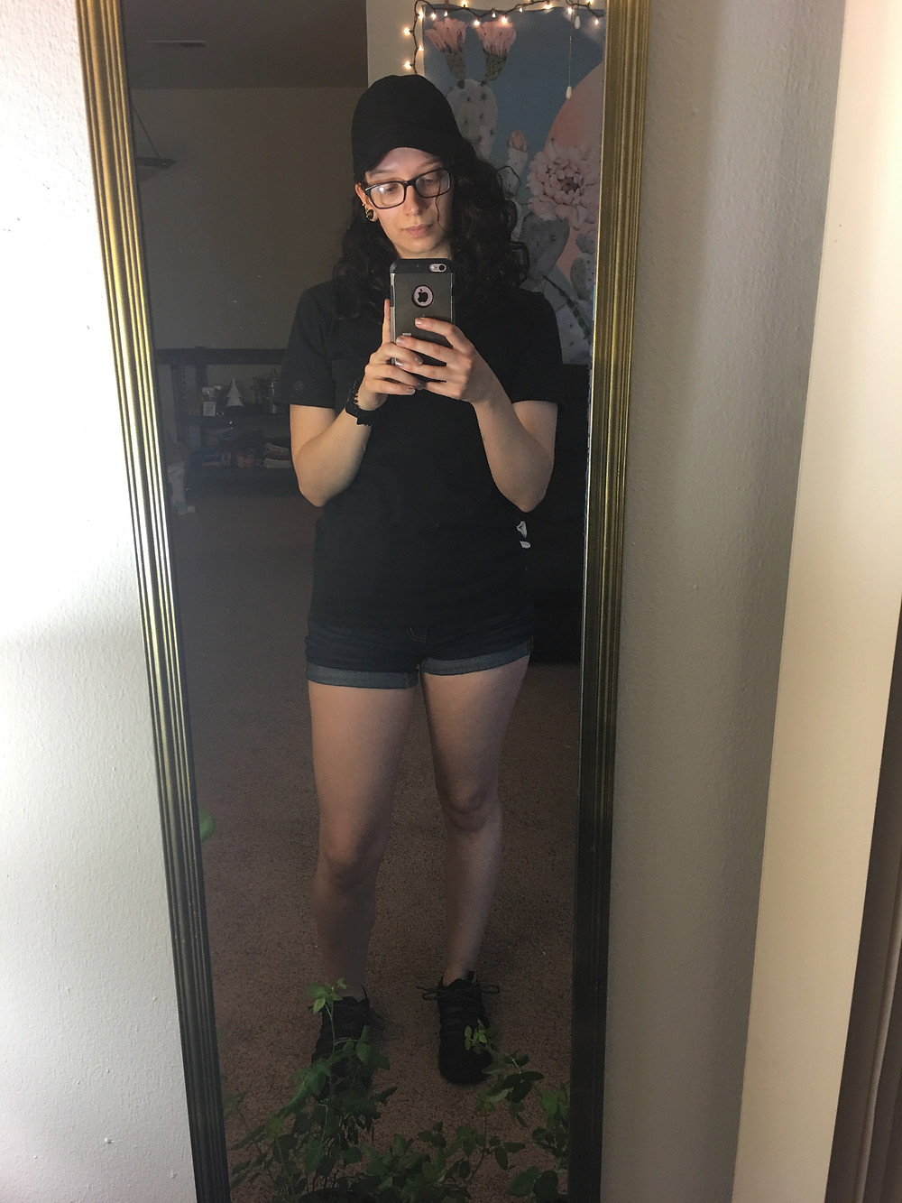 Same shirt, same denim shorts, a plain black baseball hat from Walmart, and black and gold Puma sneakers
