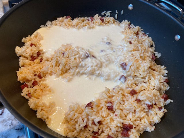 Pour in egg mixture and stir