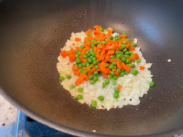 Sauté onions and add veggies