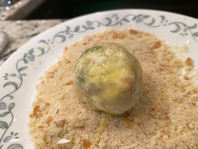 Coat with breadcrumbs