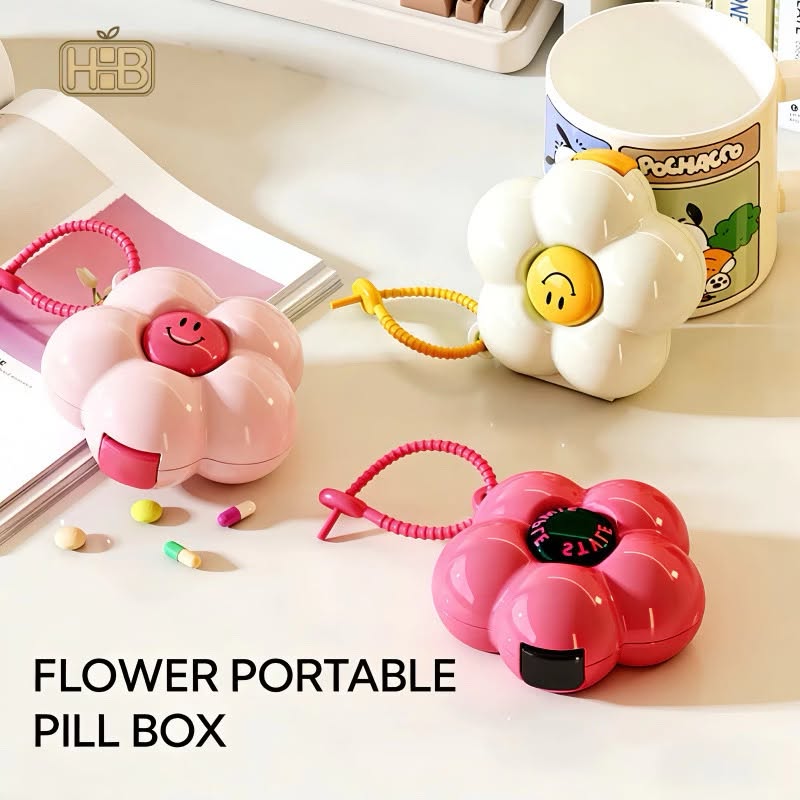 Flower-shaped portable pill cases in pink, white and red