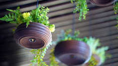 Pendant lamp crafted from sustainable wood.
Photo credit: Otto Ng of LAAB Architects