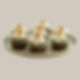 Celebrate the season with our Gluten-Free Pumpkin Cupcakes topped with silky Cream Cheese Frosting and the cutest little pumpkin decor!