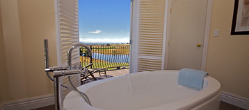 Standalone bath with country views
